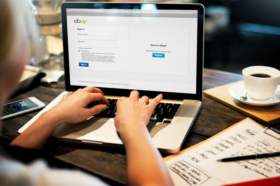 Person starting an eBay store by signing in to their account