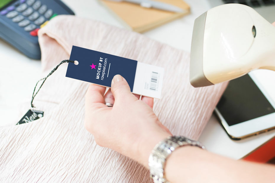 Store clerk scanning an UPC barcode at checkout
