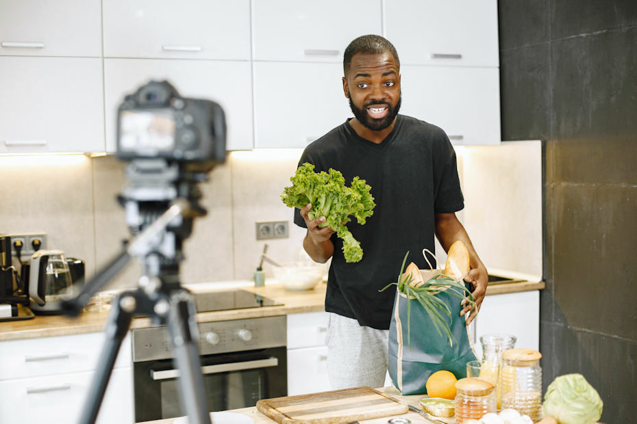 Creator making a cooking video to get paid on YouTube